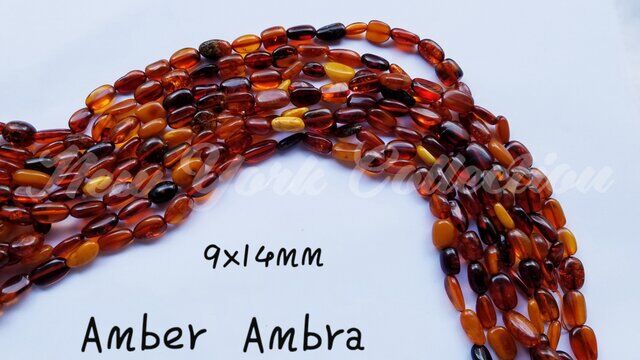 ambra naturale collana multicolore 9x14 mm.jpg