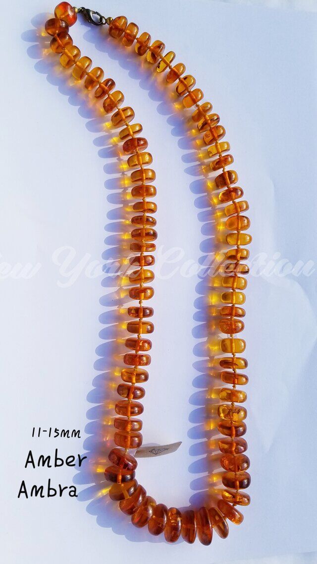 ambra naturale filo collana 11-15mm.jpg